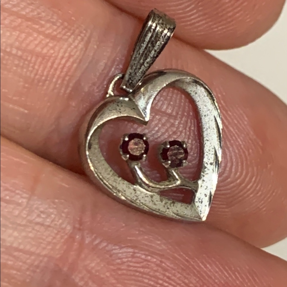 Heart-Shaped Sterling Silver Pendant with Red Garnet Flower Accents